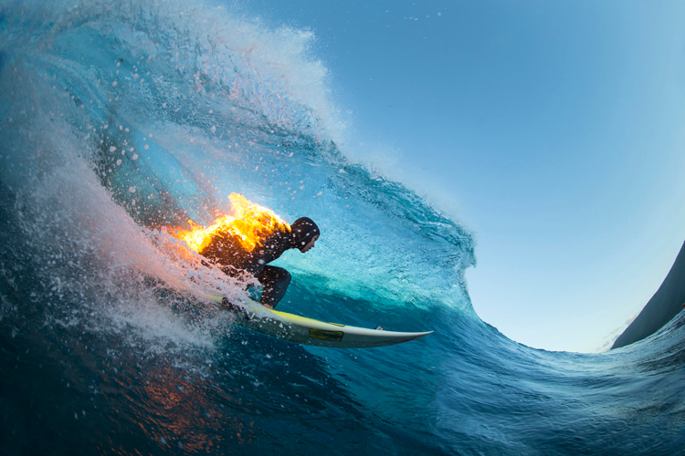 Jamie O'Brien: barreled and fired up at Tahiti's Teahupoo | Photo: Red Bull