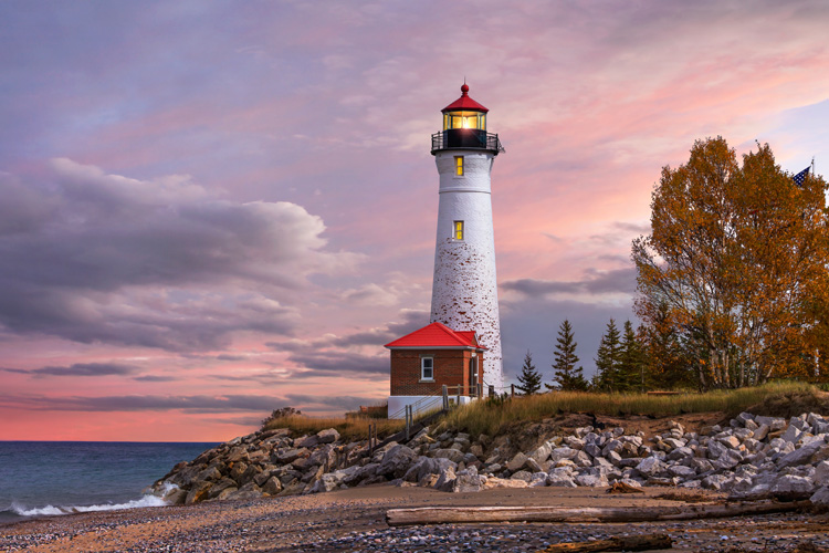 Lighthouse: a tall structure that helps guide ships to port at night