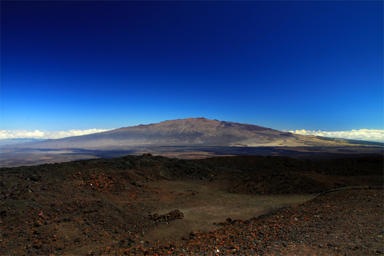 Mauna Kea: controversially called a seamount, it rises more than 33,500 feet from its base on the ocean floor to up above | Photo: Mauna Loa Observatory/Creative Commons